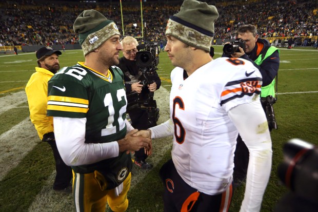Green Bay Packers quarterback Aaron Rodgers (12) shakes hands with Chicago Bears quarterback Jay Cutler (6) at the end of their game at Lambeau Field, in Green Bay, Wisconsin on Nov. 9, 2014. The Packers won 55-14. (Nuccio DiNuzzo/Chicago Tribune)