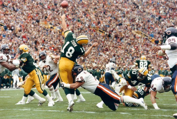 Chicago Bears tackle Steve McMichael hammers Green Bay quarterback Jim Zorn just after Zorn releases the ball on Nov. 3, 1985, at Lambeau Field. The Bears pressured Zorn all day, but had only three sacks one by McMichael and two by Dan Hampton. (Bob Langer/Chicago Tribune)