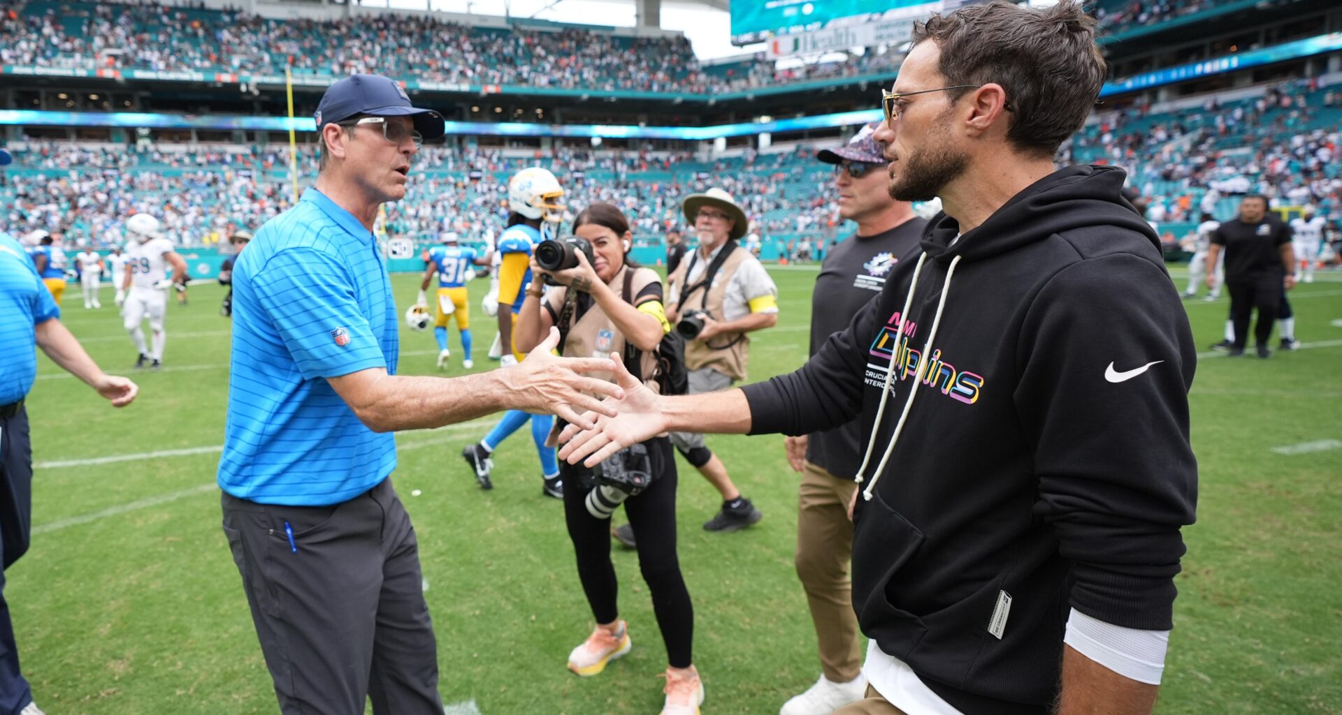 Mike McDaniel Jokes He's 'The Same Guy' as Jim Harbaugh in Video After Taking Chargers OC Job