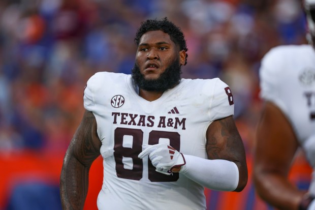 Texas A&M defensive lineman Samu Taumanupepe (88) runs onto the field during an NCAA college football game against Florida, Saturday, Sept. 14, 2024, in Gainesville, Fla. (AP Photo/Gary McCullough)