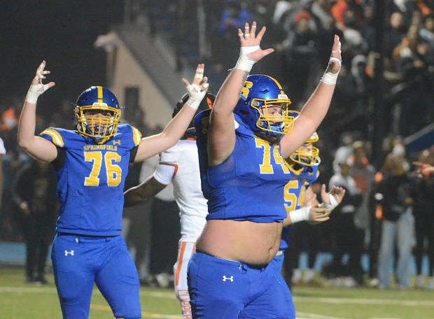 Springfield linemen, left, Jaxon Deconti, left, and Dom Stewart celebrate a first-half touchdown against Chester in the District a Class 5A final Friday night. (PETE BANNAN/MediaNews Group)