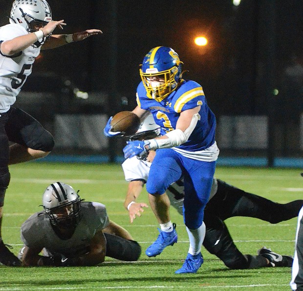 Springfield's Luke Valerio picks up yardage in an Oct. 24 game against Strath Haven. (Pete Bannan/MediaNews Group)