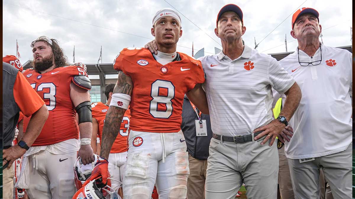 Clemson Tigers cornerback Avieon Terrell (8) stands with head coach Dabo Swinney after losing to the Syracuse Orange at Memorial Stadium.
