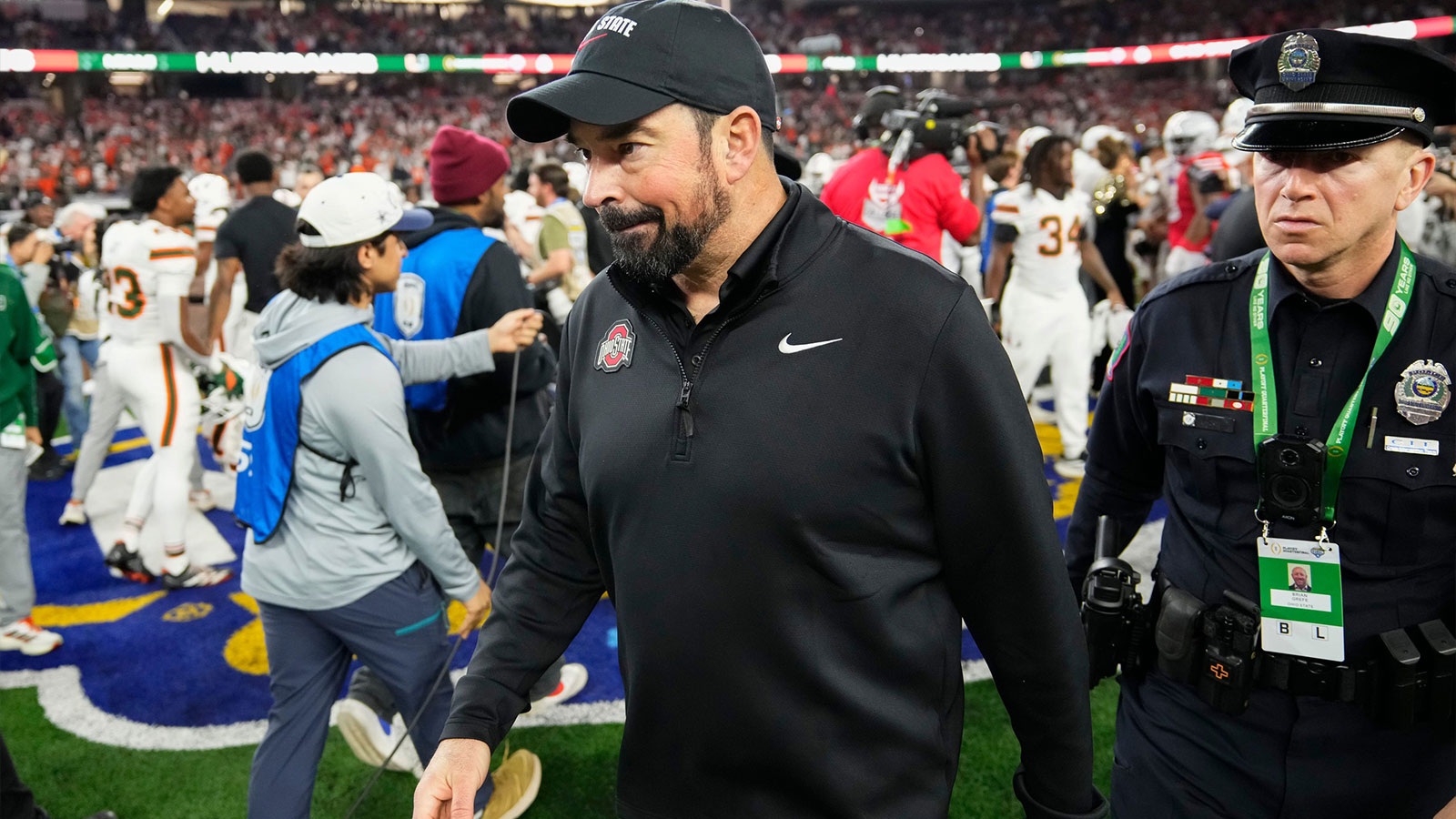 Ohio State Buckeyes head coach Ryan Day leaves the field following the Cotton Bowl at AT&T Stadium in Arlington, Texas for the College Football Playoff quarterfinal game against the Miami Hurricanes on Dec. 31, 2025. Ohio State lost 24-14.