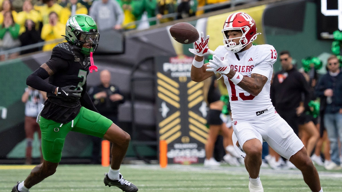 Indiana wide receiver Elijah Sarratt hauls in a pass under cover from Oregon defensive back Sione Laulea as the Oregon Ducks host the Indiana Hoosiers Oct. 11, 2025, at Autzen Stadium in Eugene, Oregon.