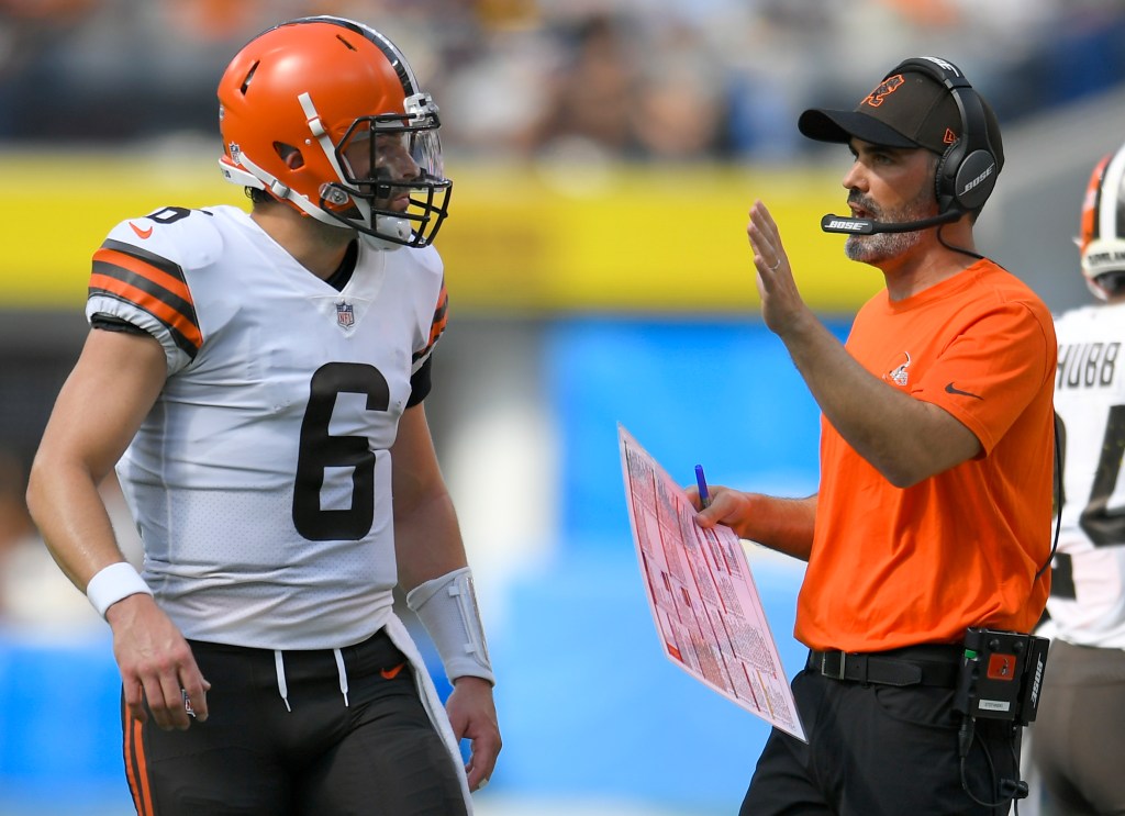 Baker Mayfield #6 of the Cleveland Browns talks to head coach Kevin Stefanski during a 2021 game.