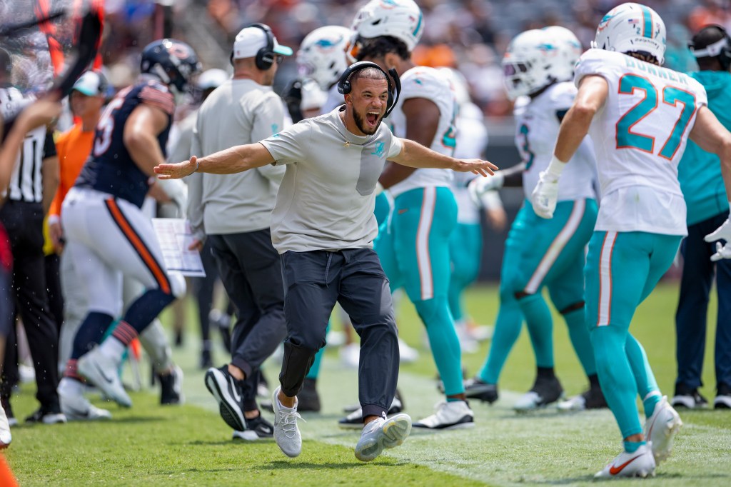 Miami Dolphins coach Mike McDaniel yelling on the sideline during a game against the Chicago Bears.