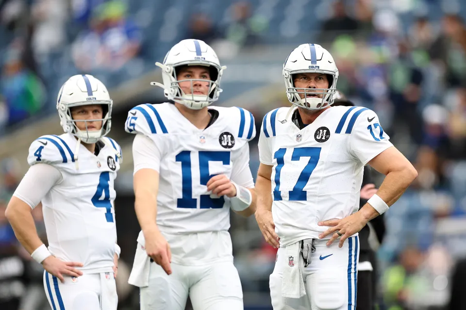 SEATTLE, WASHINGTON - DECEMBER 14: Philip Rivers #17 of the Indianapolis Colts warms up with Riley Leonard #15 and Brett Rypien #4 prior to the game against the Seattle Seahawks at Lumen Field on December 14, 2025 in Seattle, Washington. (Photo by Steph Chambers/Getty Images)