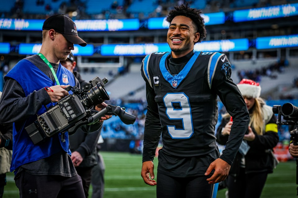 Bryce Young #9 of the Carolina Panthers smiles after an NFL game against the Tampa Bay Buccaneers