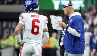LAS VEGAS, NEVADA - DECEMBER 28: Jaxson Dart #6 and interim head coach Mike Kafka of the New York Giants talk in the second quarter of a game against the Las Vegas Raiders at Allegiant Stadium on December 28, 2025 in Las Vegas, Nevada. (Photo by Ian Maule/Getty Images)