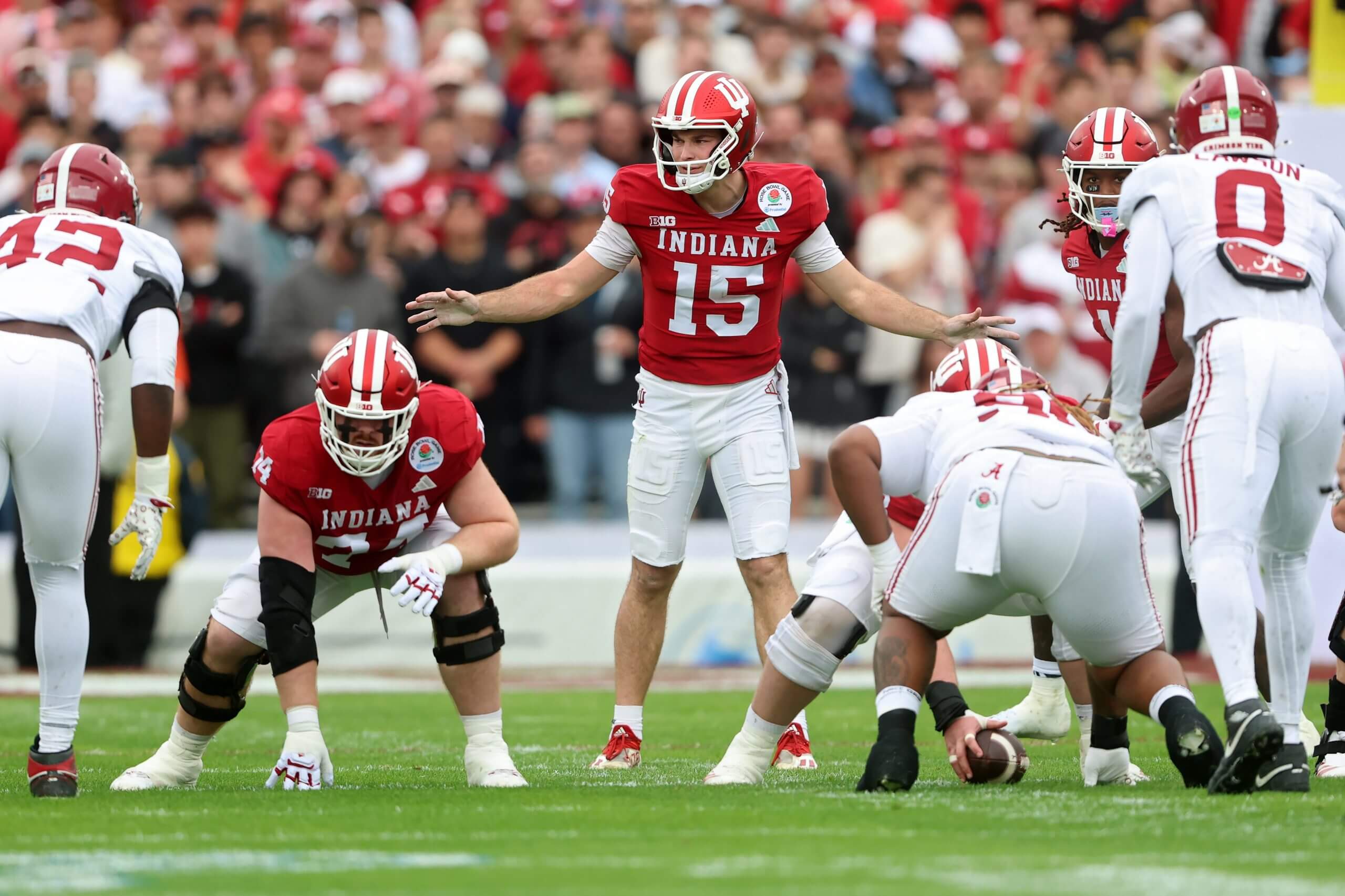 Fernando Mendoza lines up behind the offensive line. 