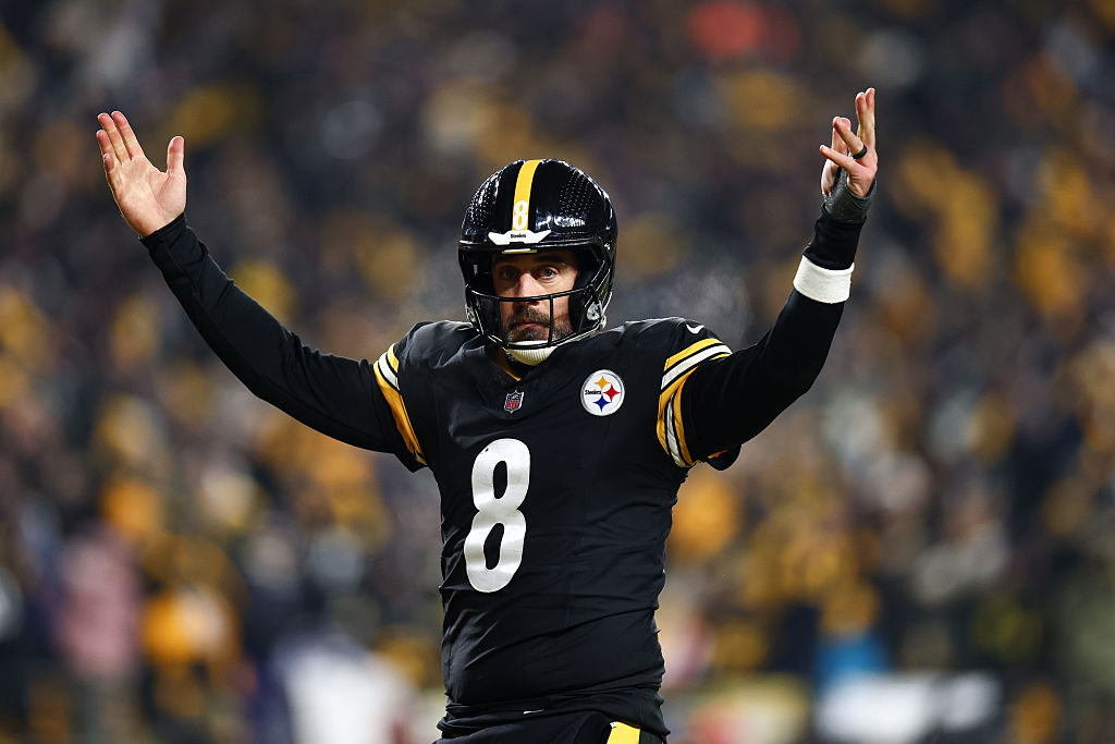 PITTSBURGH, PENNSYLVANIA - JANUARY 4: Aaron Rodgers #8 of the Pittsburgh Steelers celebrates after throwing a touchdown pass during the fourth quarter against the Baltimore Ravens at Acrisure Stadium on January 4, 2026 in Pittsburgh, Pennsylvania. (Photo by Kevin Sabitus/Getty Images)