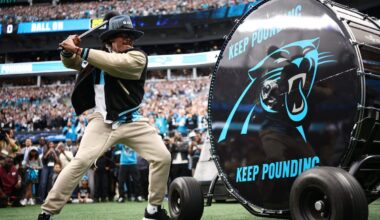 Cam Newton returns, gets Panthers-Rams started by pounding the drum