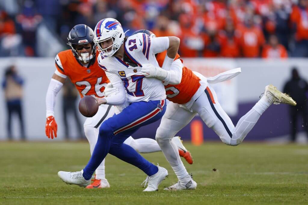 Josh Allen fumbles the ball in the second quarter of Buffalo's loss to Denver.