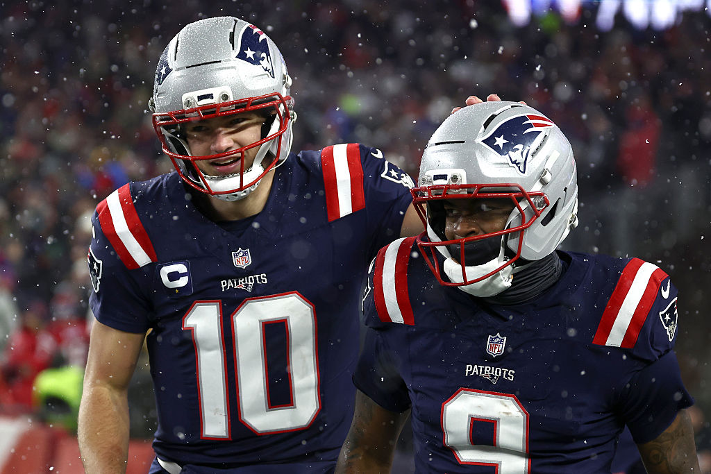 FOXBOROUGH, MASSACHUSETTS - JANUARY 18: Drake Maye #10 of the New England Patriots celebrates with Kayshon Boutte #9 after a touchdown pass against the Houston Texans during the fourth quarter in the AFC Divisional Playoff game at Gillette Stadium on January 18, 2026 in Foxborough, Massachusetts. (Photo by Winslow Townson/Getty Images)