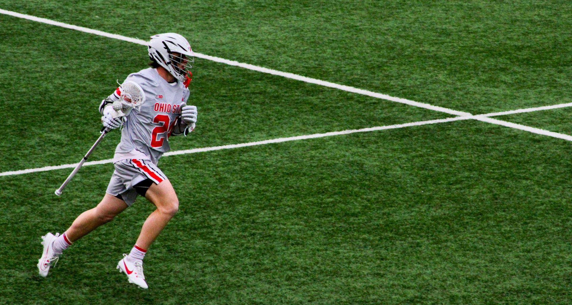 Then fourth-year Gannon Matthews (24) runs the ball in a 2025 Ohio State Men