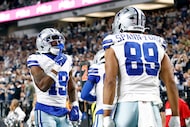 Dallas Cowboys wide receiver Ryan Flournoy (19) points to the sky after scoring a touchdown...