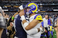 Dallas Cowboys quarterback Dak Prescott (4) talks with Los Angeles Rams quarterback Matthew...