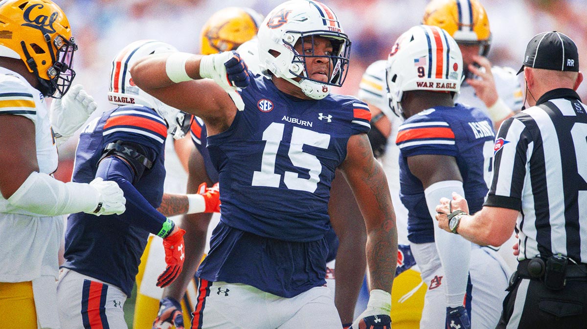 Auburn Tigers defensive lineman Keldric Faulk (15) celebrates a stop as Auburn Tigers take on California Golden Bears at Jordan-Hare Stadium in Auburn, Ala.