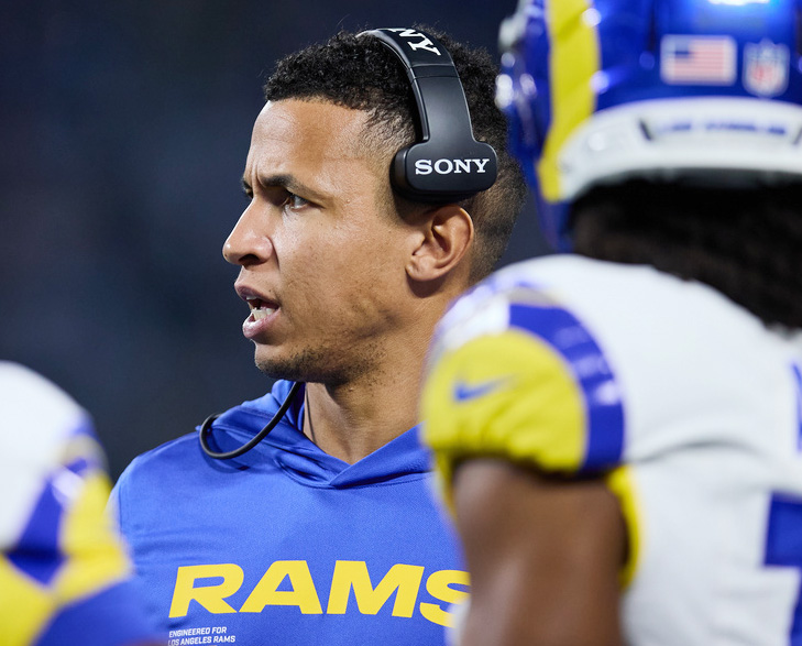 Los Angeles Rams pass game coordinator Nate Scheelhaase huddles with the offense during an NFL wild card playoff football game against the Carolina Panthers, Saturday, Jan. 10, 2026, in Charlotte, N.C.