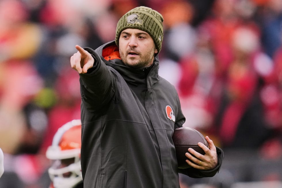 Cleveland Browns offensive coordinator Tommy Rees gestures before an NFL football game against...