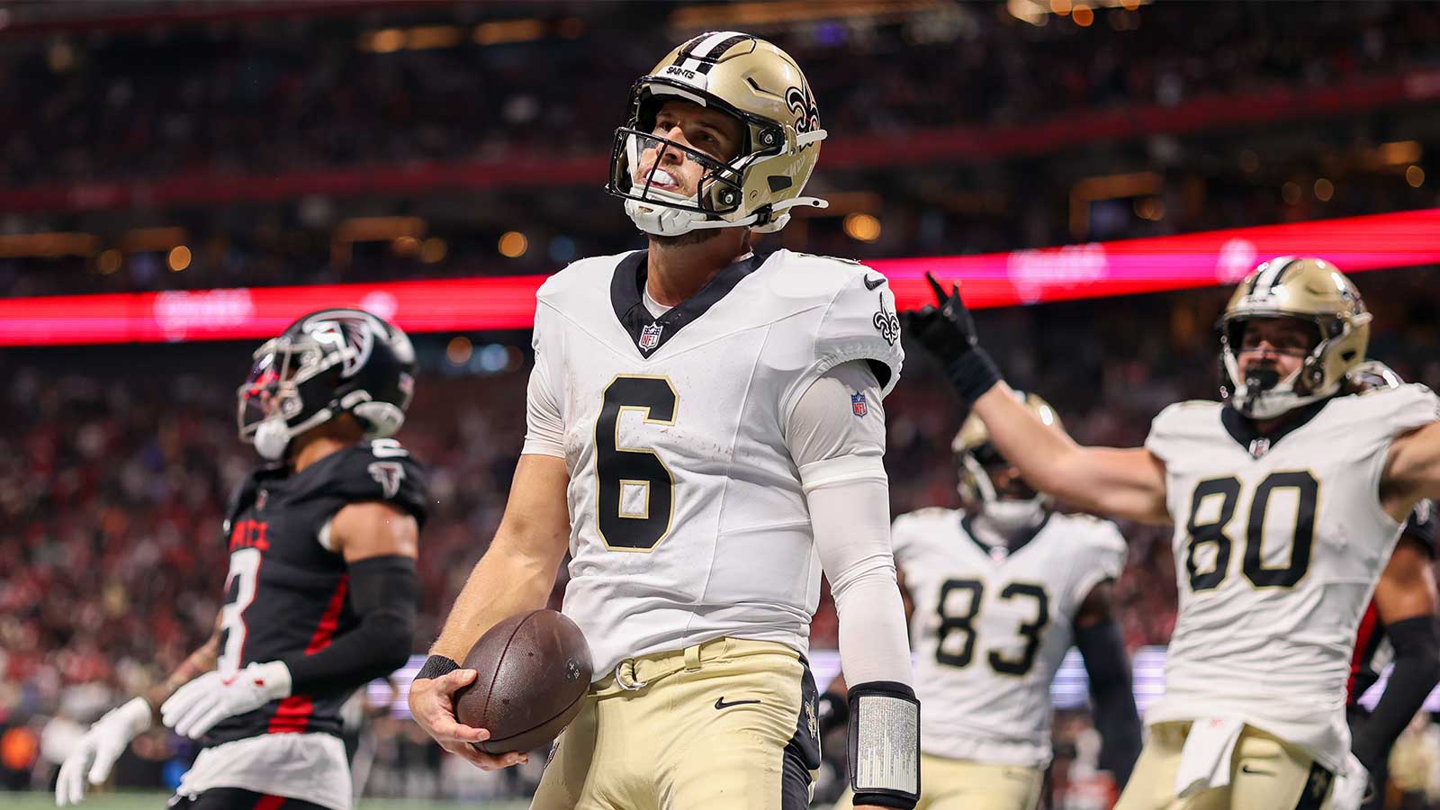 New Orleans Saints quarterback Tyler Shough (6) celebrates after a touchdown against the Atlanta Falcons in the second quarter at Mercedes-Benz Stadium.