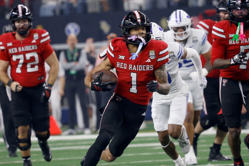 Texas Tech wide receiver Reggie Virgil (1) carries the ball during the first half of the Big...