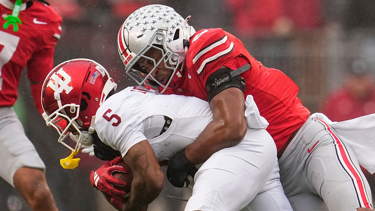 Ohio State Buckeyes safety Sonny Styles (6) tackles Indiana Hoosiers wide receiver Ke'Shawn Williams (5) during the NCAA football game at Ohio Stadium in Columbus on Monday, Nov. 25, 2024. Ohio State won 38-15.