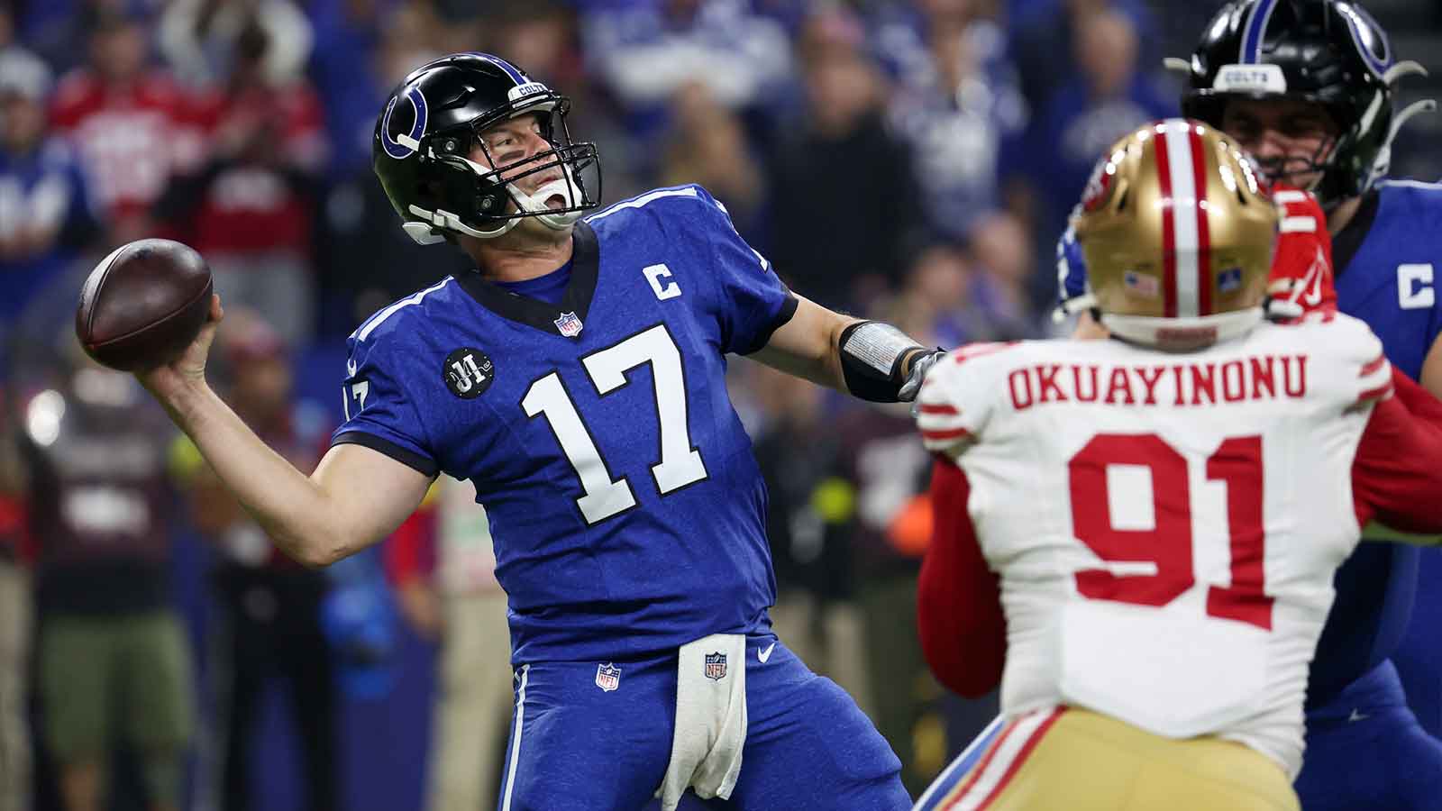 Indianapolis Colts quarterback Philip Rivers (17) passes the ball against the San Francisco 49ers in the first quarter of the game at Lucas Oil Stadium. 