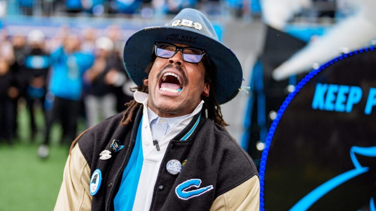Former Carolina Panthers player Cam Newton beats on a drum before an NFL wild-card playoff football game between the Carolina Panthers and the Los Angeles Rams on Saturday, Jan. 10, 2026, in Charlotte, N.C.