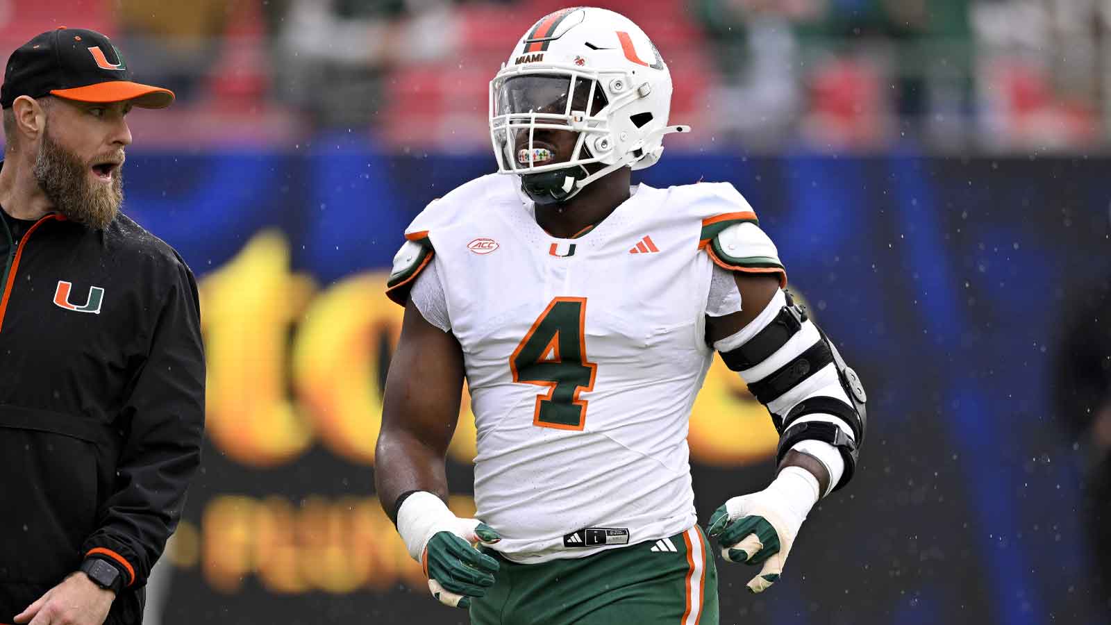 Miami Hurricanes defensive lineman Rueben Bain Jr. (4) warms up before the game against the SMU Mustangs at Gerald J. Ford Stadium.