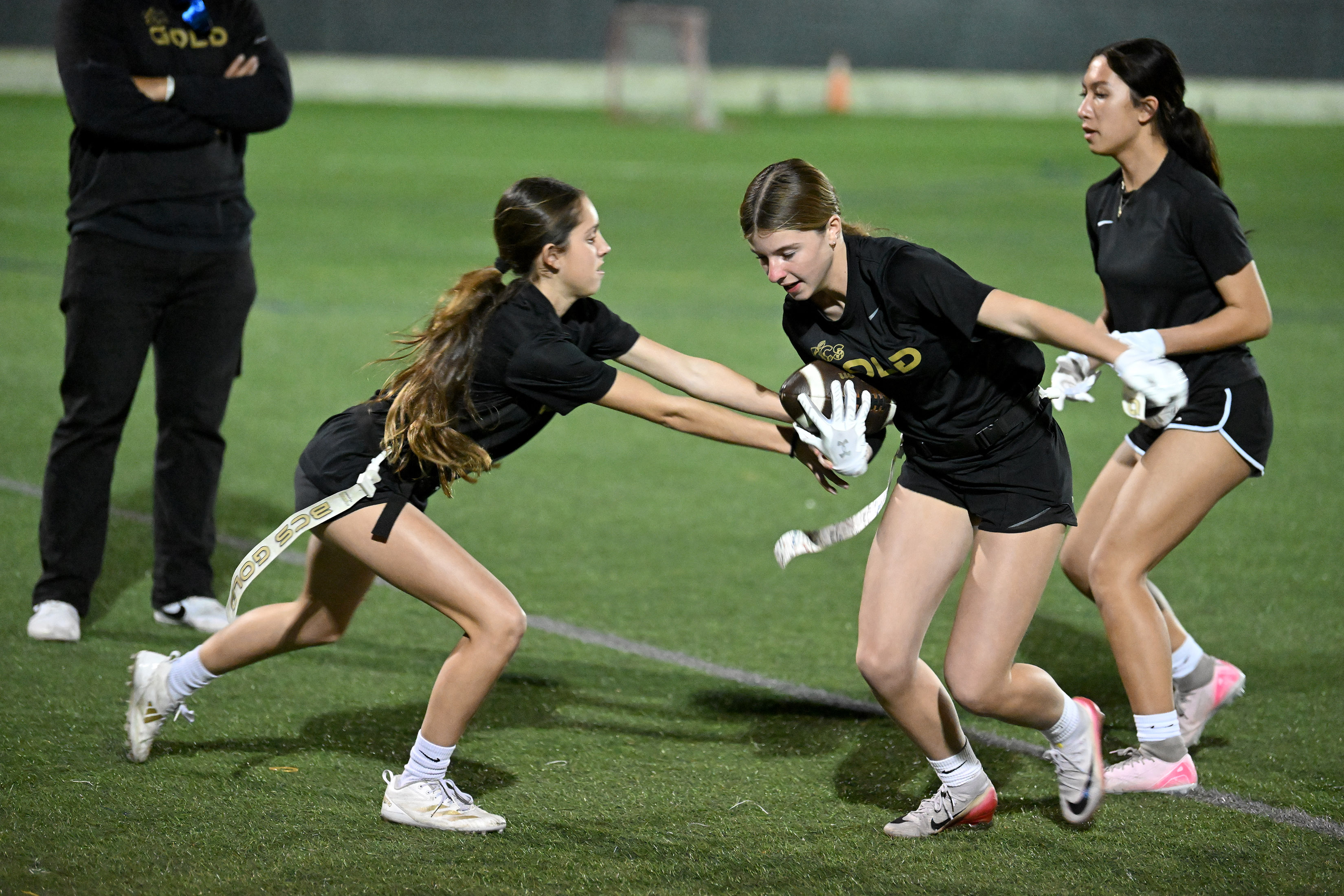 Zetta Gomez, left, Nina Coppola and Halle Ellsworth participate doing...