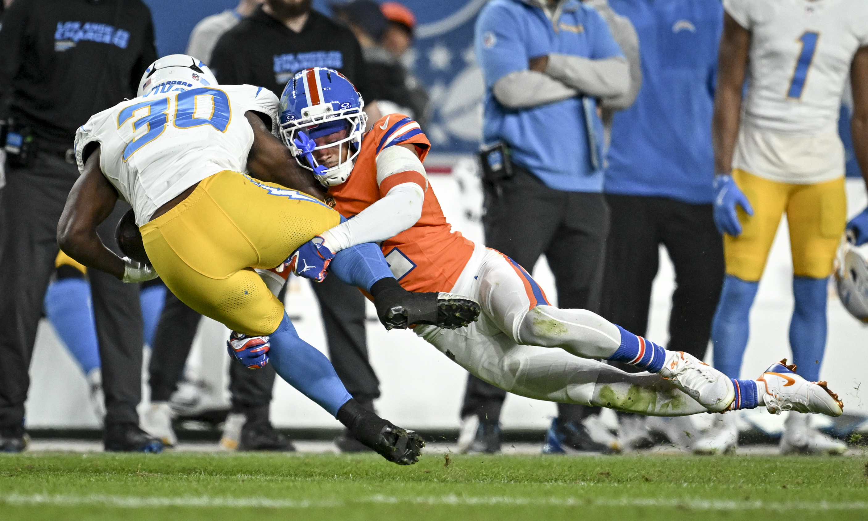 Pat Surtain II (2) of the Denver Broncos blows up...