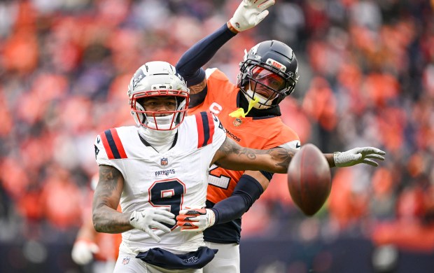 Pat Surtain II (2) of the Denver Broncos breaks up a pass intended for Kayshon Boutte (9) of the New England Patriots during the second quarter at Empower Field at Mile High in Denver on Sunday, Jan. 25, 2026. (Photo by AAron Ontiveroz/The Denver Post)
