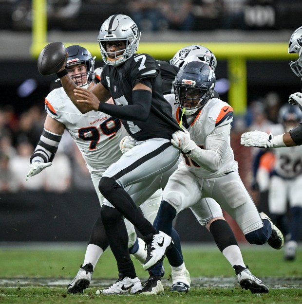 Nik Bonitto (15) of the Denver Broncos sacks Geno Smith (7) of the Las Vegas Raiders during the second quarter at Allegiant Stadium in Las Vegas, Nevada on Sunday, Dec. 7, 2025. (Photo by AAron Ontiveroz/The Denver Post)