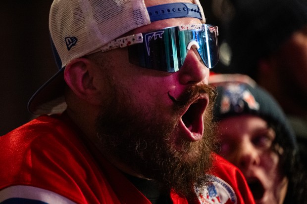 New England Patriots fan Brian Kureta screams among his fellow fans on Saturday, Jan. 24, 2026, at Jackson's LODO in Denver. (Photo by Timothy Hurst/The Denver Post)