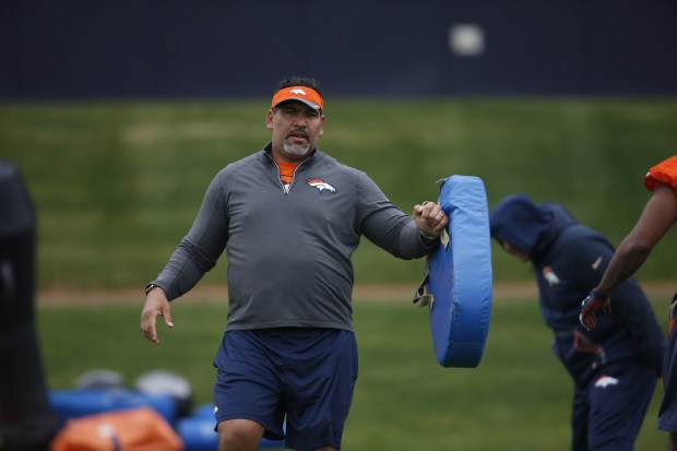 Denver Broncos chaplain Luther Elliss during the team's NFL rookie camp football practice Saturday, May 7, 2016, in the team's headquarters in Englewood, Colo. (AP Photo/David Zalubowski)