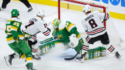 Dec 23, 2024; Saint Paul, Minnesota, USA; Chicago Blackhawks left wing Nick Foligno (17) scores a goal past Minnesota Wild goaltender Filip Gustavsson (32) during the second period at Xcel Energy Center. Mandatory Credit: Matt Krohn-Imagn Images