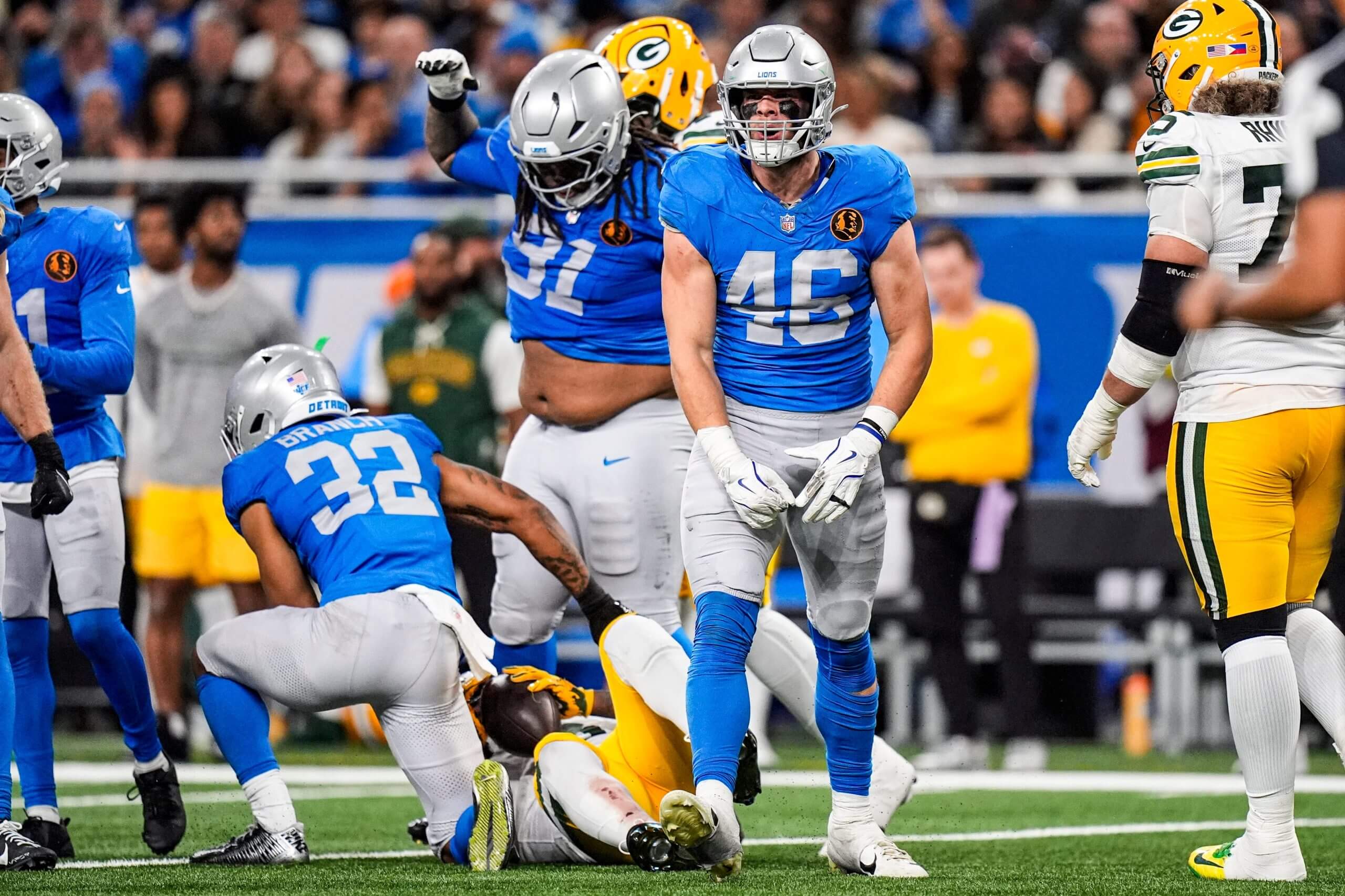 Detroit Lions linebacker Jack Campbell celebrates a stop against the Green Bay Packers during a game at Ford Field in Detroit on Nov. 27, 2025.