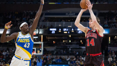 Nov 29, 2025; Indianapolis, Indiana, USA; Chicago Bulls forward Matas Buzelis (14) shoots the ball against Indiana Pacers forward Pascal Siakam (43) during the first half at Gainbridge Fieldhouse.