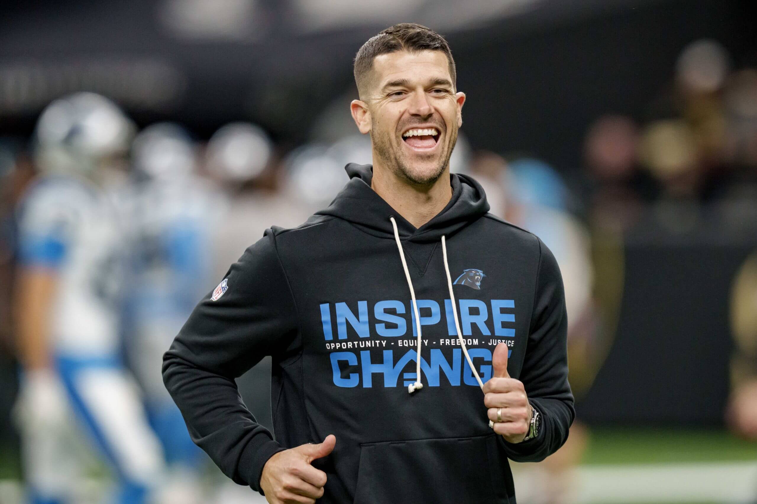 Carolina Panthers head coach Dave Canales smiles before the game against the New Orleans Saints at Caesars Superdome.