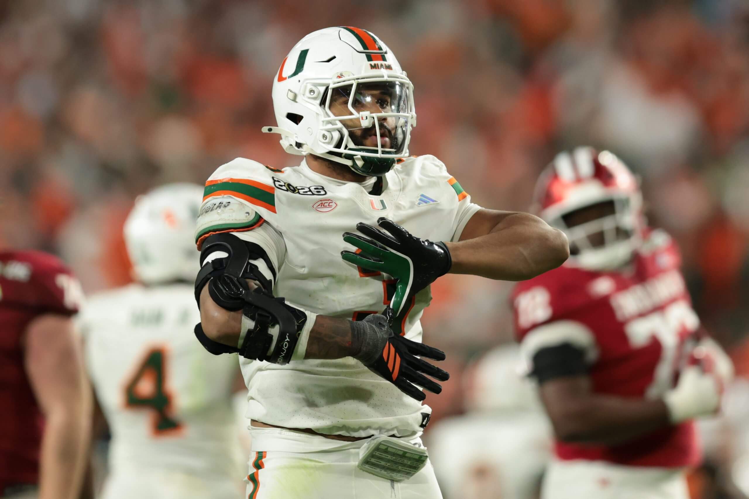 Miami Hurricanes pass rusher Akheem Mesidor celebrates making a defensive stop in the national championship game against Indiana.
