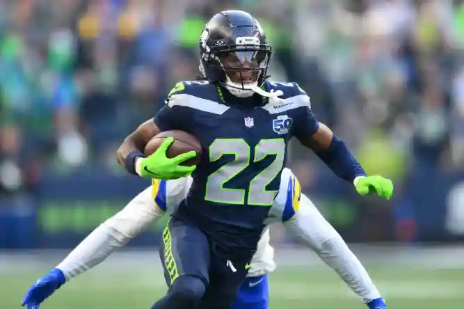 Jan 25, 2026; Seattle, WA, USA; Seattle Seahawks wide receiver Rashid Shaheed (22) runs in the first half against the Los Angeles Rams in the 2026 NFC Championship Game at Lumen Field. Mandatory Credit: Steven Bisig-Imagn Images