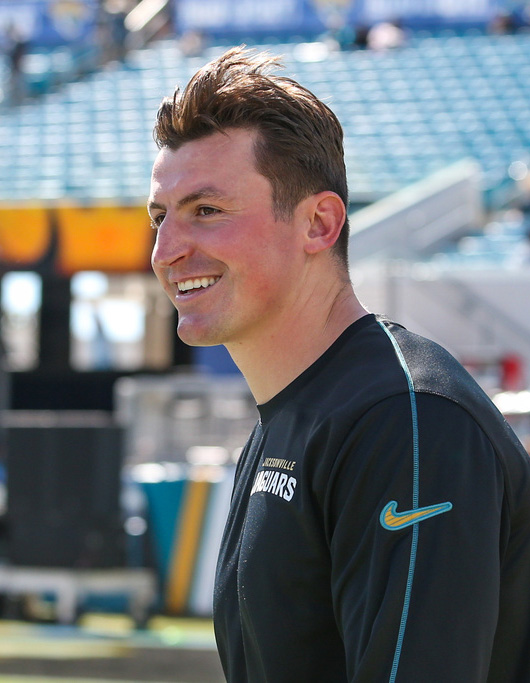 Jacksonville Jaguars offensive coordinator Grant Udinski walks the field before an NFL football game against the Seattle Seahawks, Sunday, Oct. 12, 2025, in Jacksonville, Fla. The Seahawks defeated the Jaguars 20-12.