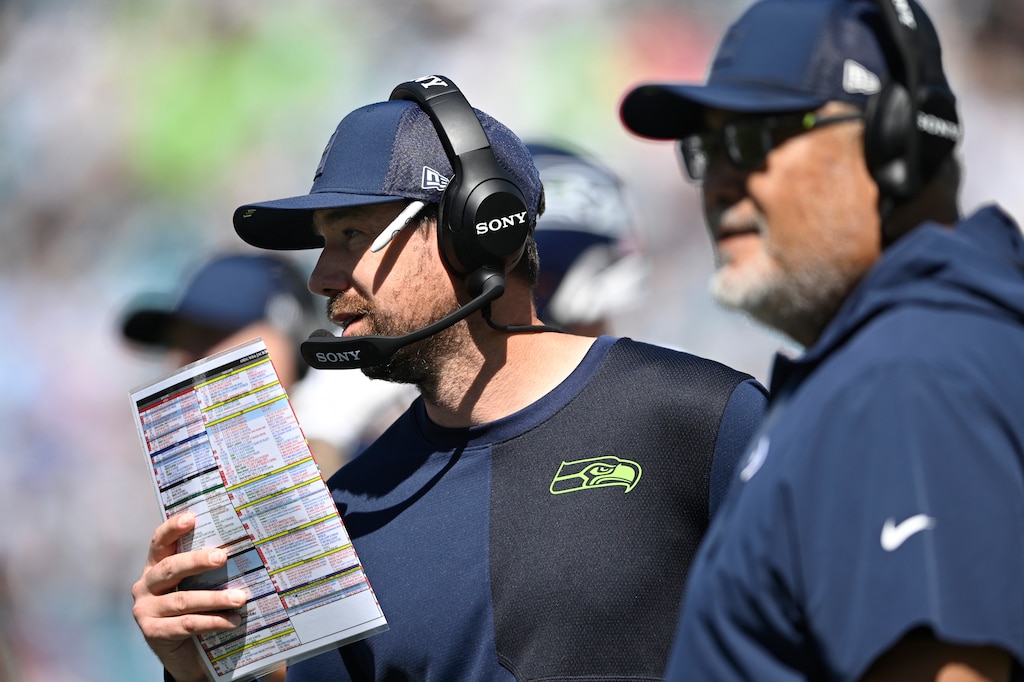 Seattle Seahawks offensive coordinator Klint Kubiak, center, works on the sideline during the first half of a game against the Jacksonville Jaguars on Oct. 12.