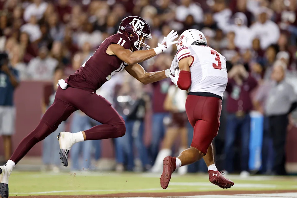 COLLEGE STATION, TEXAS - NOVEMBER 16: Tayden Barnes #3 of the New Mexico State Aggies intercepts a pass in the end zone intended for Jacob Bostick #11 of the Texas A&M Aggies in the fourth quarter at Kyle Field on November 16, 2024 in College Station, Texas. (Photo by Tim Warner/Getty Images)