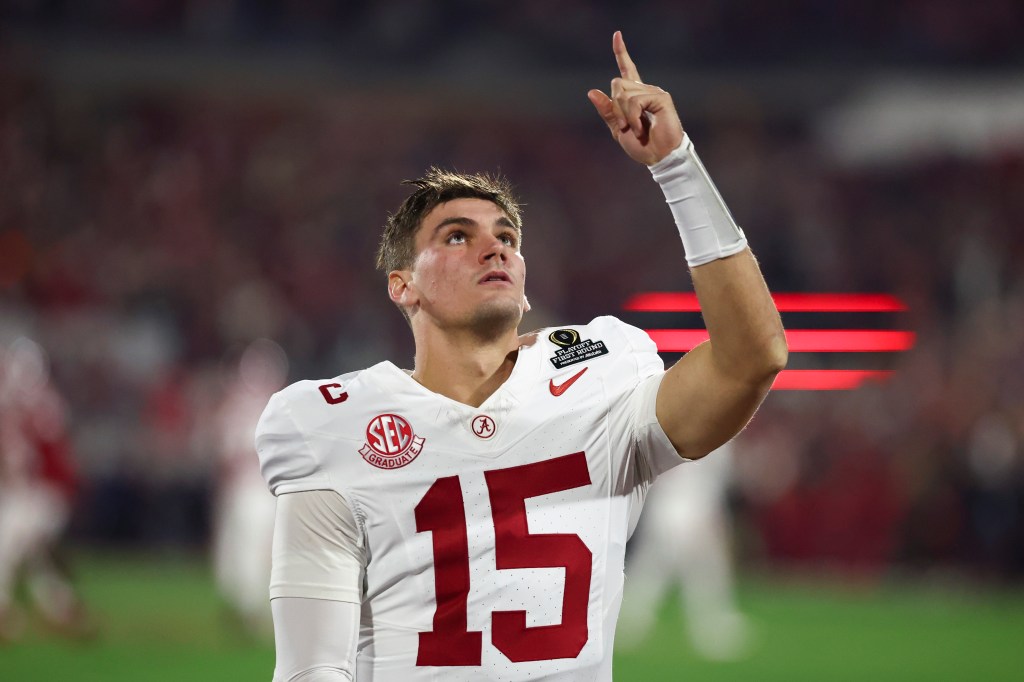Alabama Crimson Tide quarterback Ty Simpson (15) gestures prior to a game against the Oklahoma Sooners.