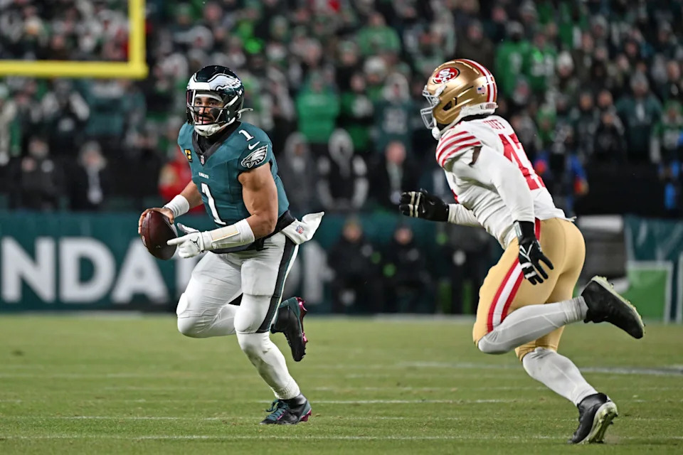 <p>Philadelphia Eagles quarterback Jalen Hurts runs from San Francisco 49ers defensive end Bryce Huff during the fourth quarter in an NFC Wild Card Round game at Lincoln Financial Field. Mandatory Credit: Eric Hartline-Imagn Images</p>