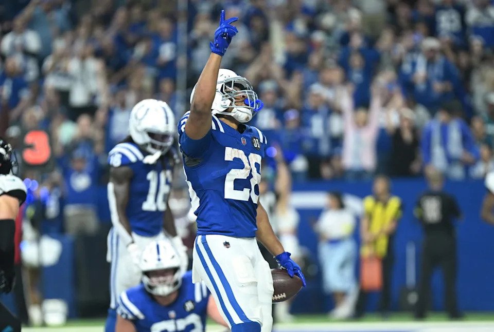 Dec 28, 2025; Indianapolis, Indiana, USA; Indianapolis Colts running back Jonathan Taylor (28) celebrates after a touchdown during the first half against the Jacksonville Jaguars at Lucas Oil Stadium. Mandatory Credit: Robert Goddin-Imagn Images