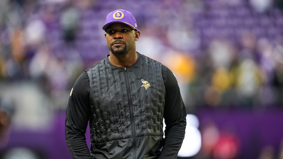 Defensive coordinator Brian Flores of the Minnesota Vikings looks on prior to a game between the Minnesota Vikings and Green Bay Packers at U.S. Bank Stadium on December 29, 2024 in Minneapolis, Minnesota